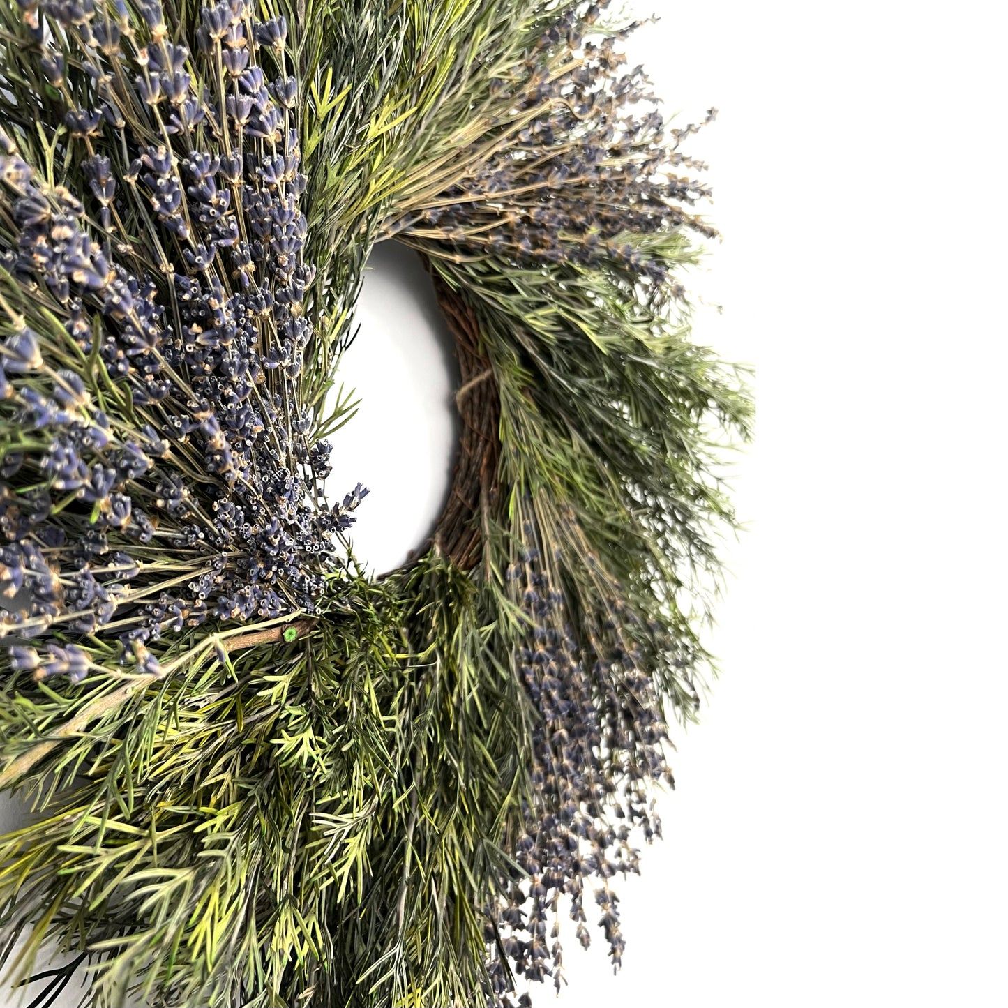 side view of the preserved boho wreath with lavender and grevillea leaves