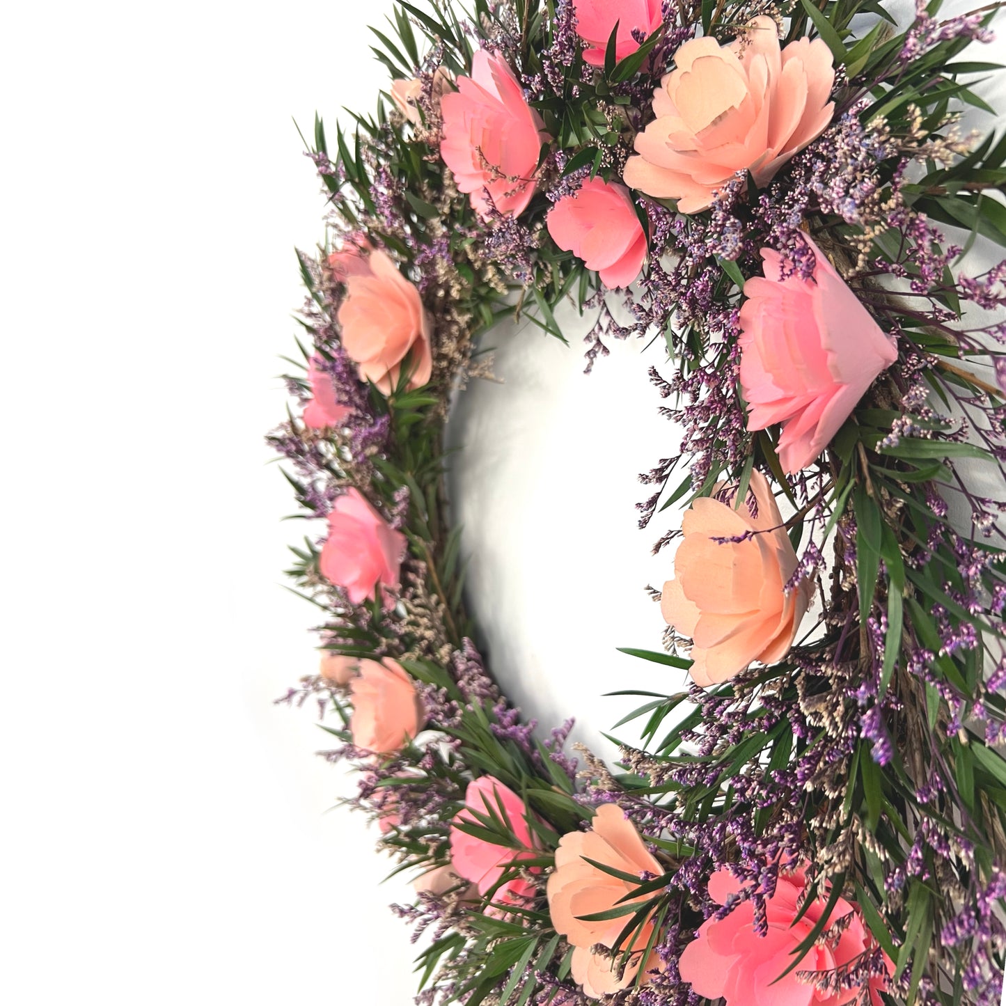 pink preserved natural wreath with handmade wooden flowers for a boho look