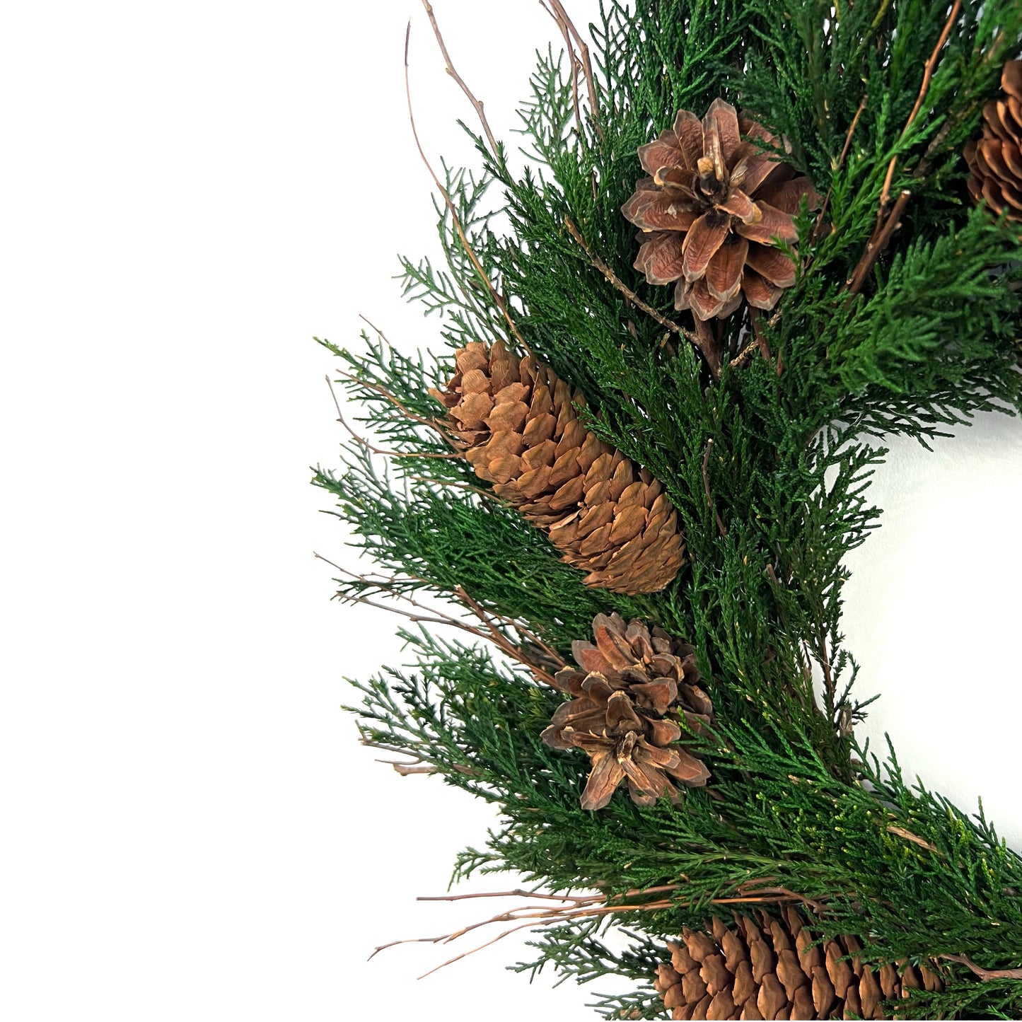 left side of the preserved juniper wreath with pinecones for farmhouse rustic decors
