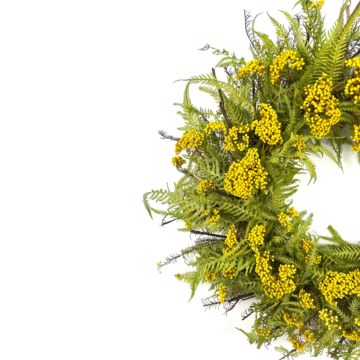 half of the preserved handmade wreath on the wall for colorful decorations