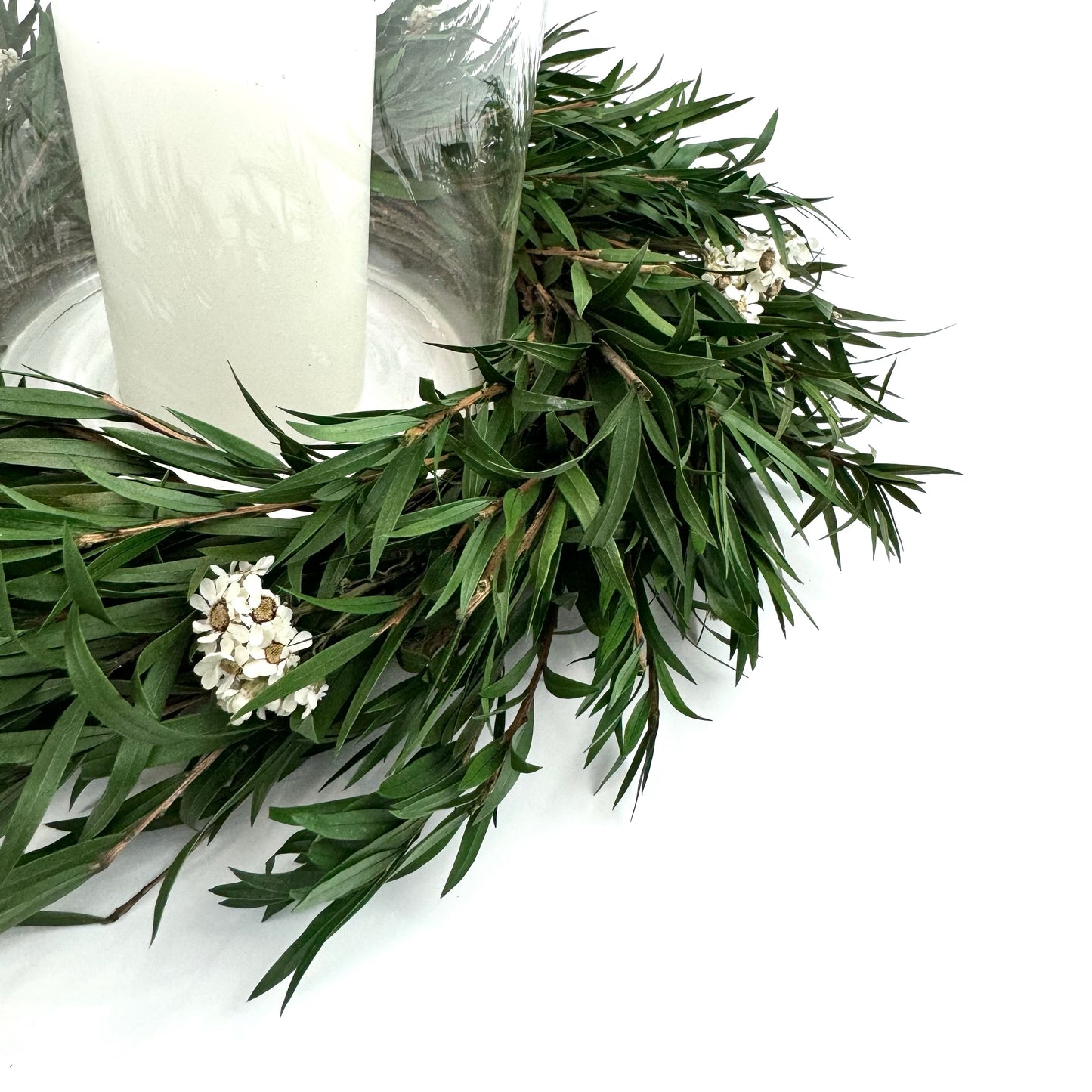 small preserved daisy flower candle ring wreath with white candle for christmas centerpiece