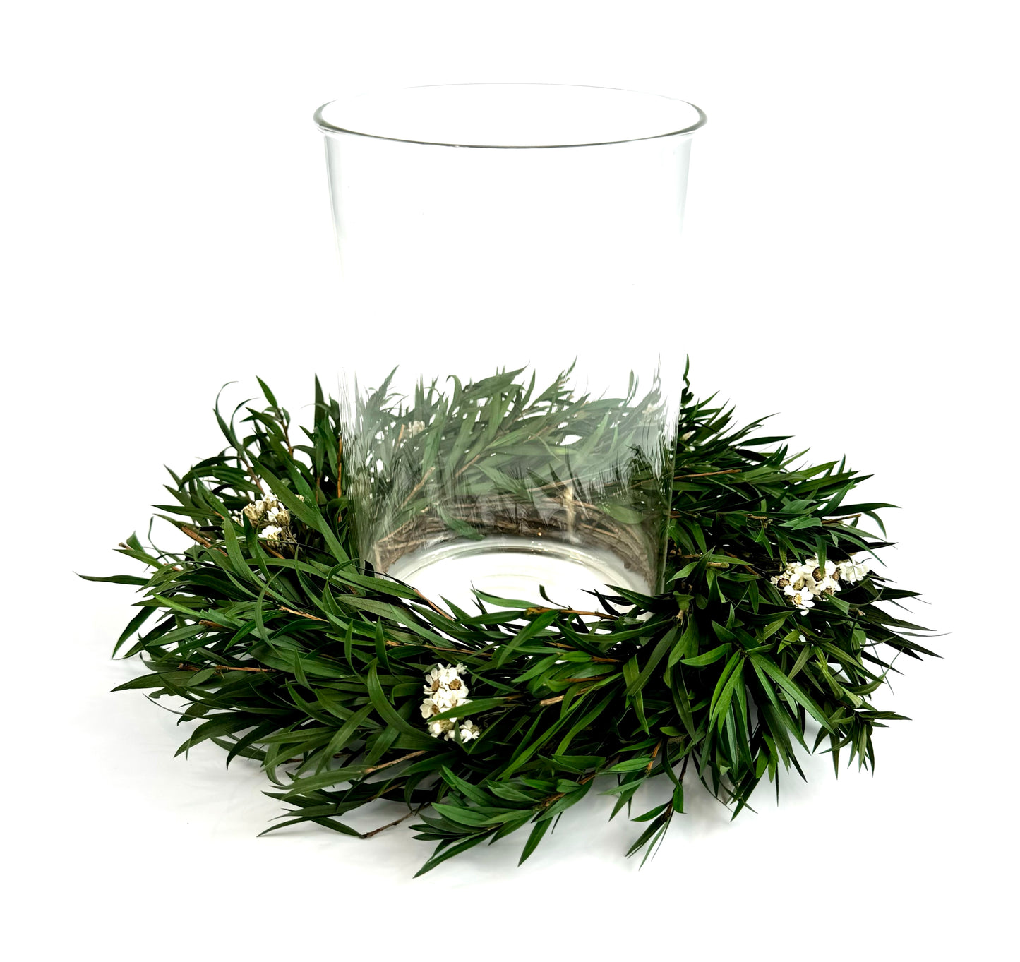 small Christmas centerpiece with preserved candle ring wreath and glass candleholder
