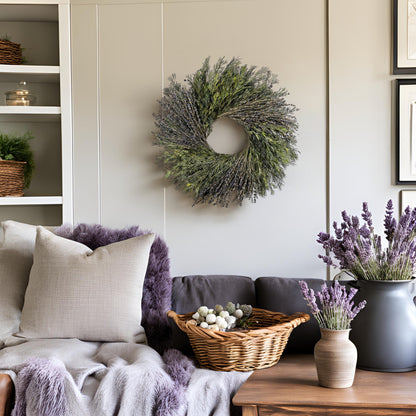 preserved boho wreath hanging in the living room with purple throw and lavender decorations