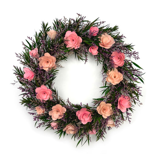 preserved floral wreath with pink handmade flowers made from shaved birch wood