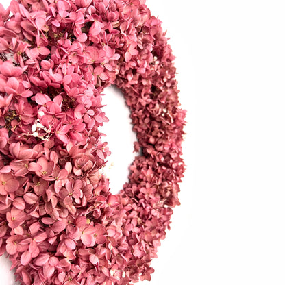 side view of the preserved pink hydrangea wreath showing depth and   details
