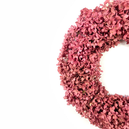 preserved light pink hydrangea wreath with white baby's breath flowers for spring decorations
