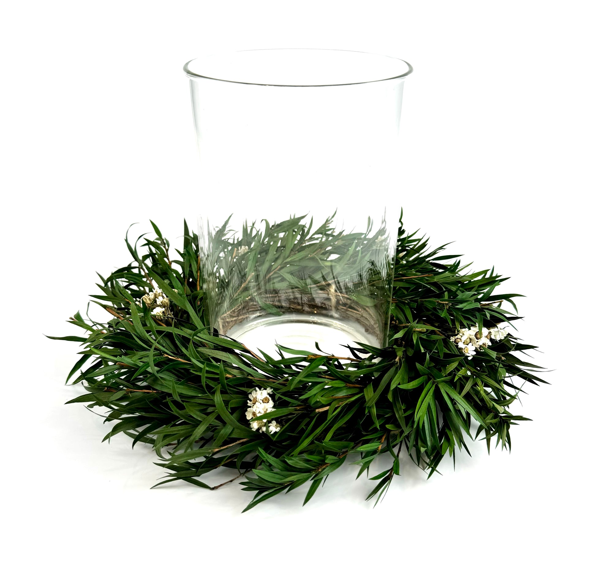 small Christmas centerpiece with preserved candle ring wreath and glass candleholder